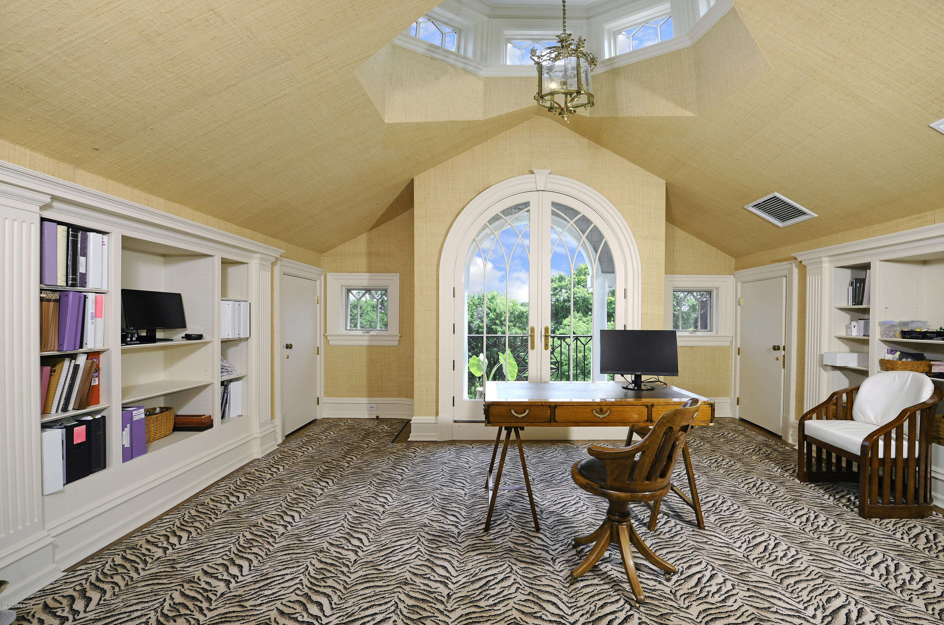 31 Rock Ridge Avenue Greenwich, CT 06831 - Photo 32 of 44 a workspace with furniture a rug and a large window