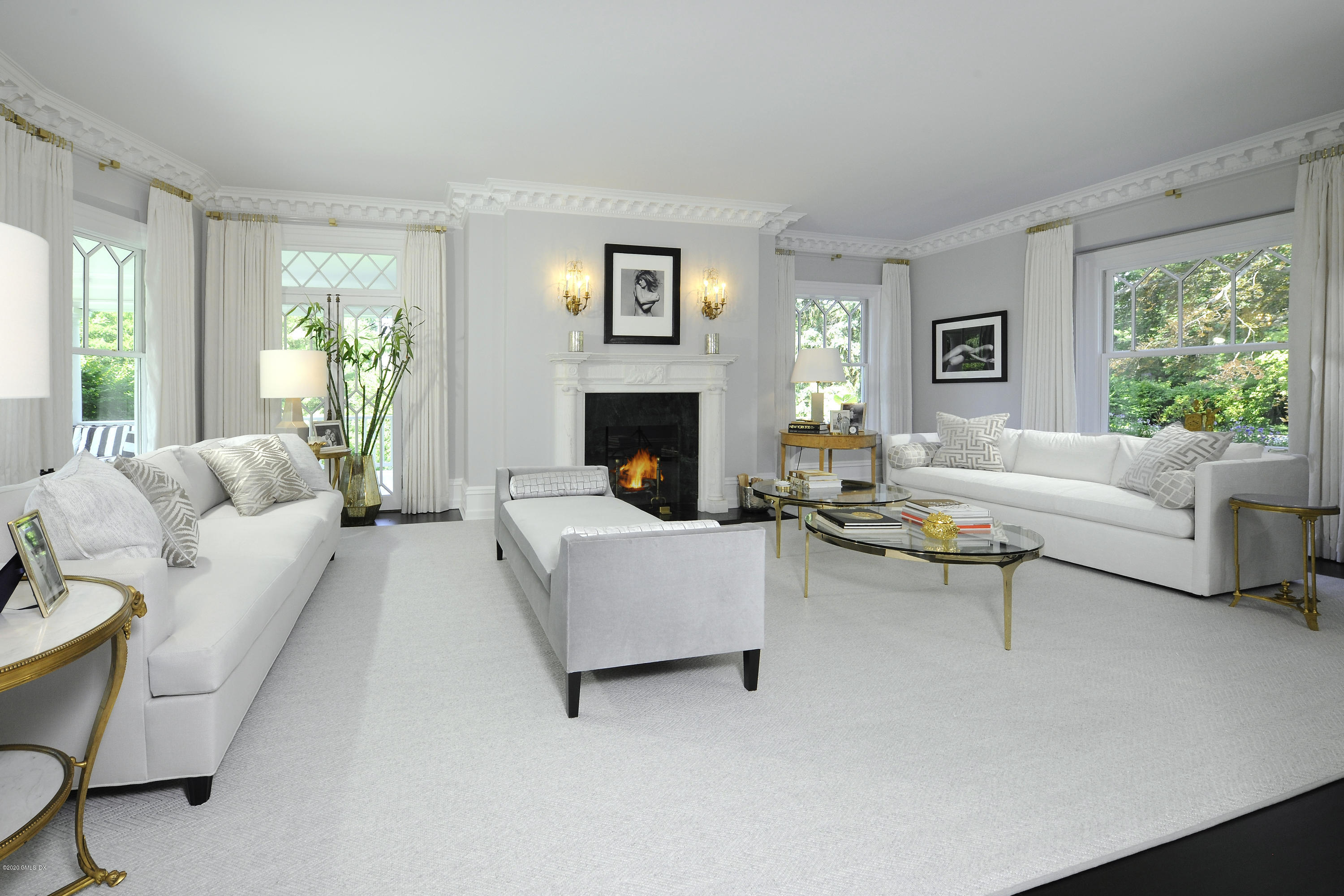 31 Rock Ridge Avenue Greenwich, CT 06831 - Photo 5 of 44 a living room with furniture and a fireplace