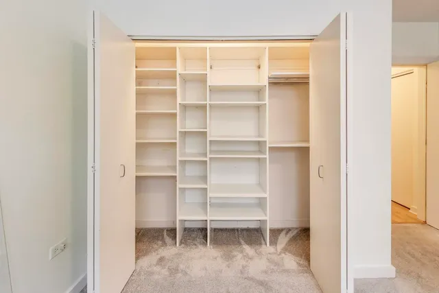 a view of a room with shelves