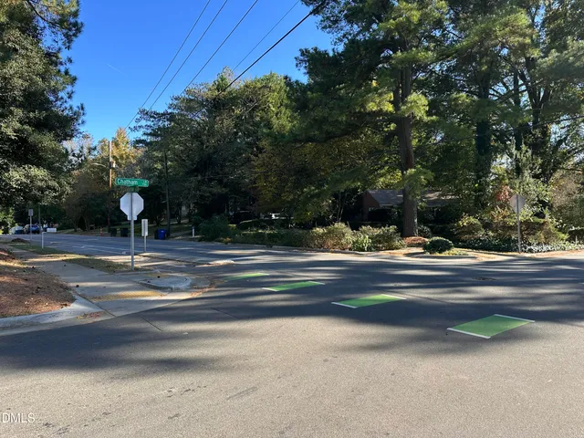 a view of street along with trees