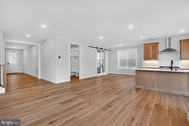 a view of kitchen and wooden floor