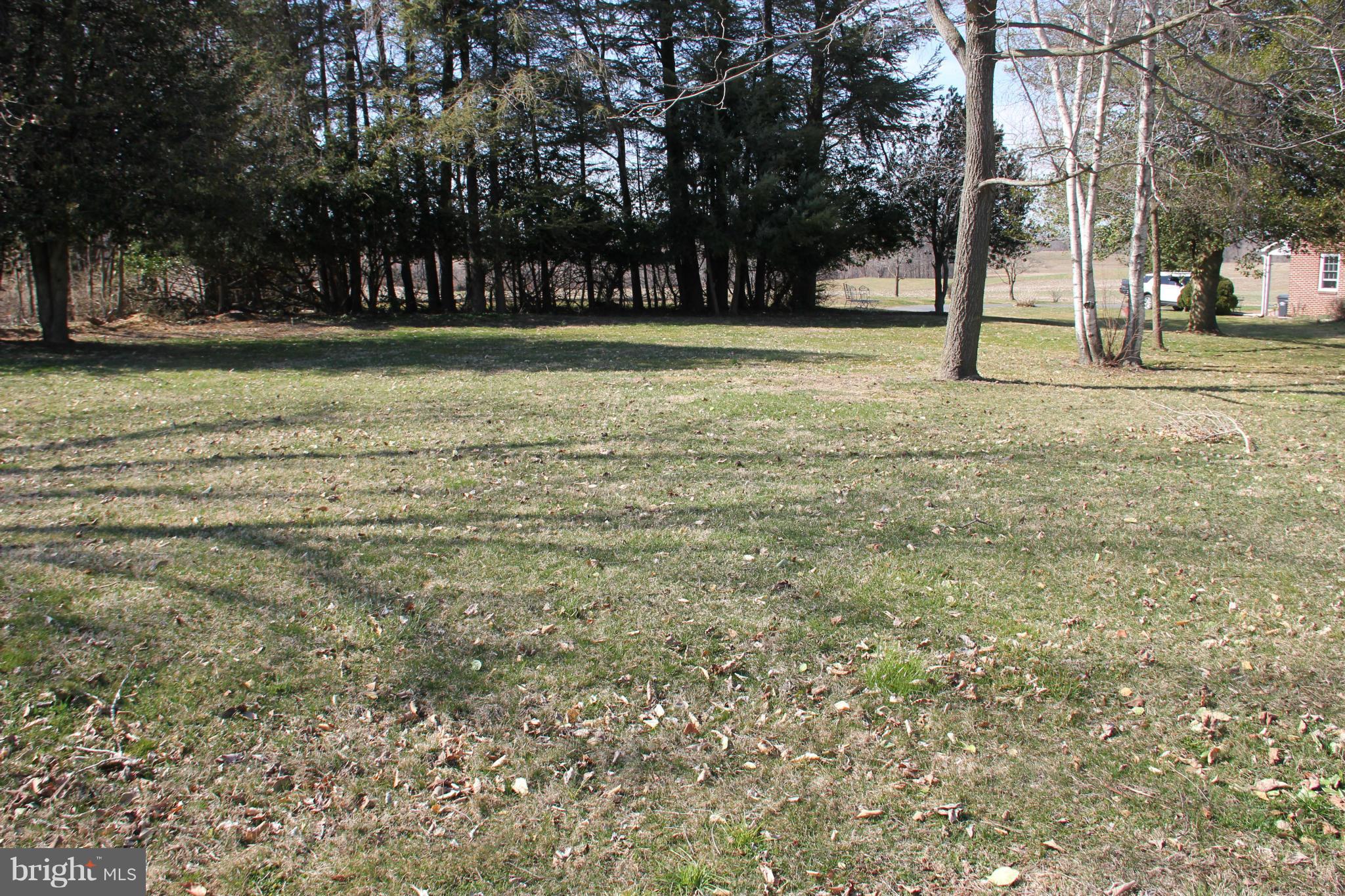 Shuresville Road Darlington, MD 21034 - Photo 1 of 3 a view of a tennis ground with trees in the background