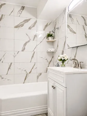 a bathroom with a sink and a bathtub