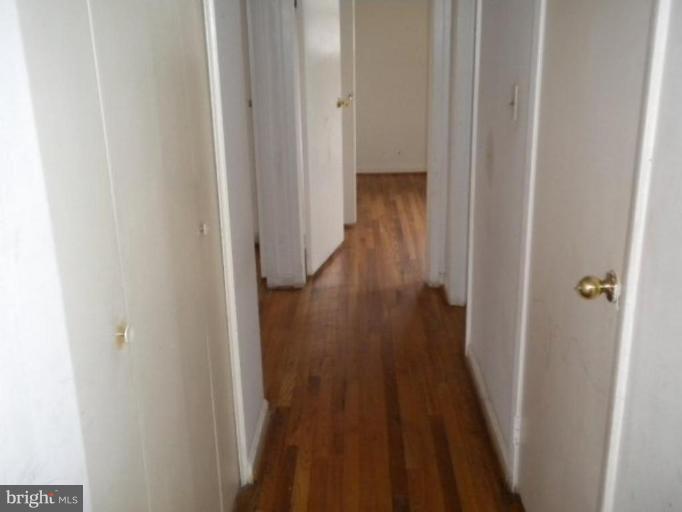12500 Barbara Road Silver Spring, MD 20906 - Photo 8 of 11 a view of a hallway with wooden floor