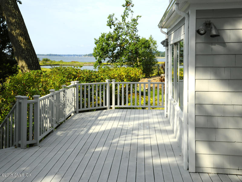 8 Indian Point Lane Riverside, CT 06878 - Photo 13 of 18 a view of a balcony with wooden floor