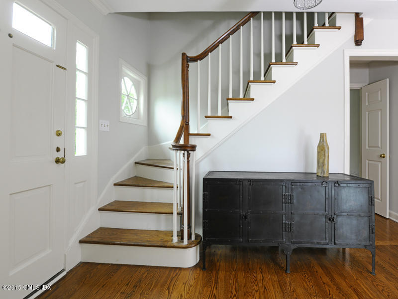 8 Indian Point Lane Riverside, CT 06878 - Photo 4 of 18 a view of entryway and hall with wooden floor