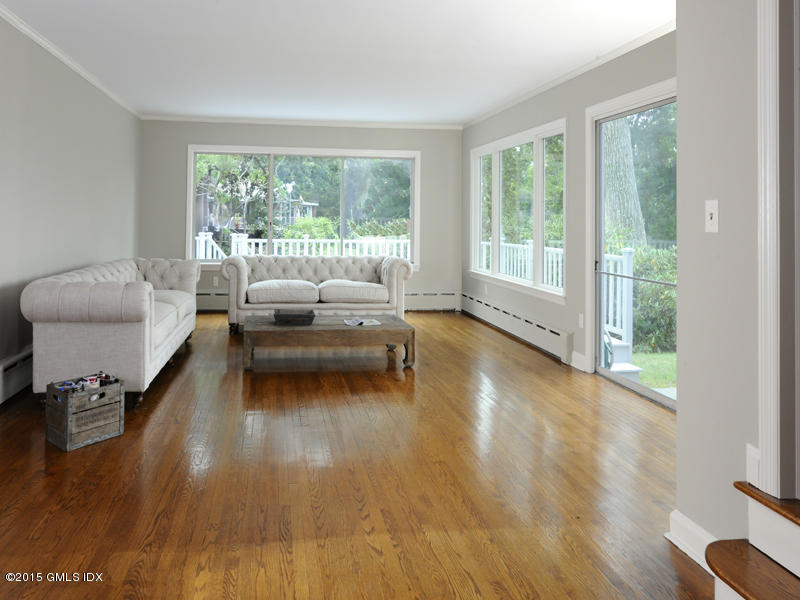 8 Indian Point Lane Riverside, CT 06878 - Photo 5 of 18 a living room with furniture and a large window