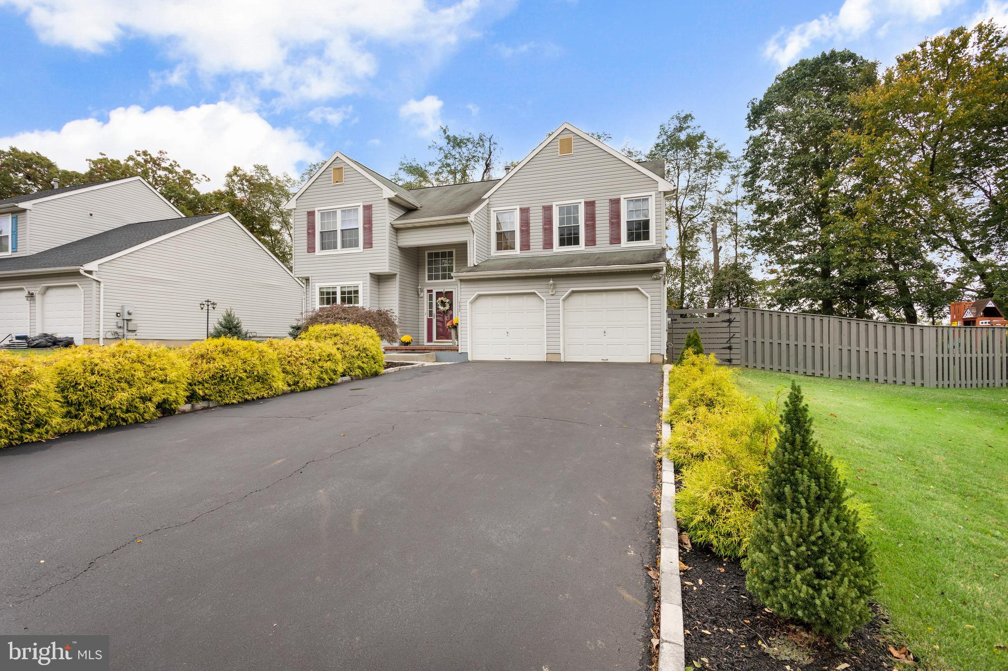 135 Cornflower Road Trenton, NJ 08620 - Photo 2 of 31 a front view of a house with garden
