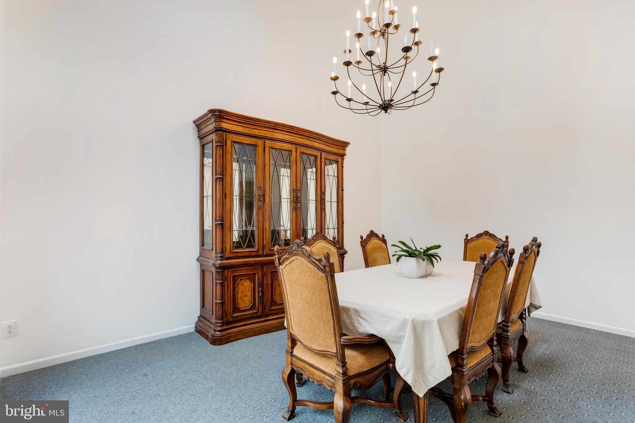 135 Cornflower Road Trenton, NJ 08620 - Photo 18 of 31 a view of a dining room with furniture and chandelier