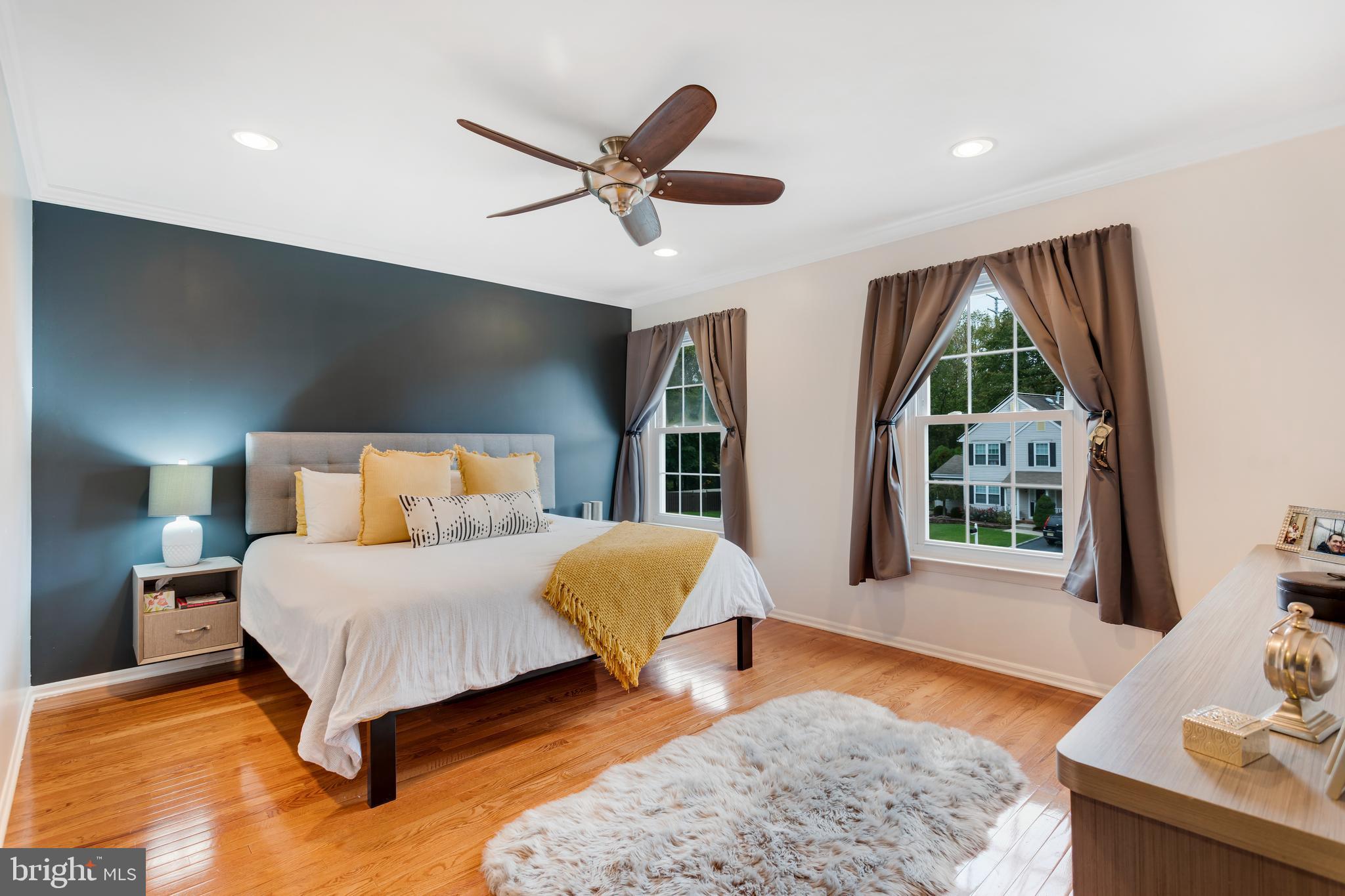135 Cornflower Road Trenton, NJ 08620 - Photo 21 of 31 a spacious bedroom with a large bed and a large window