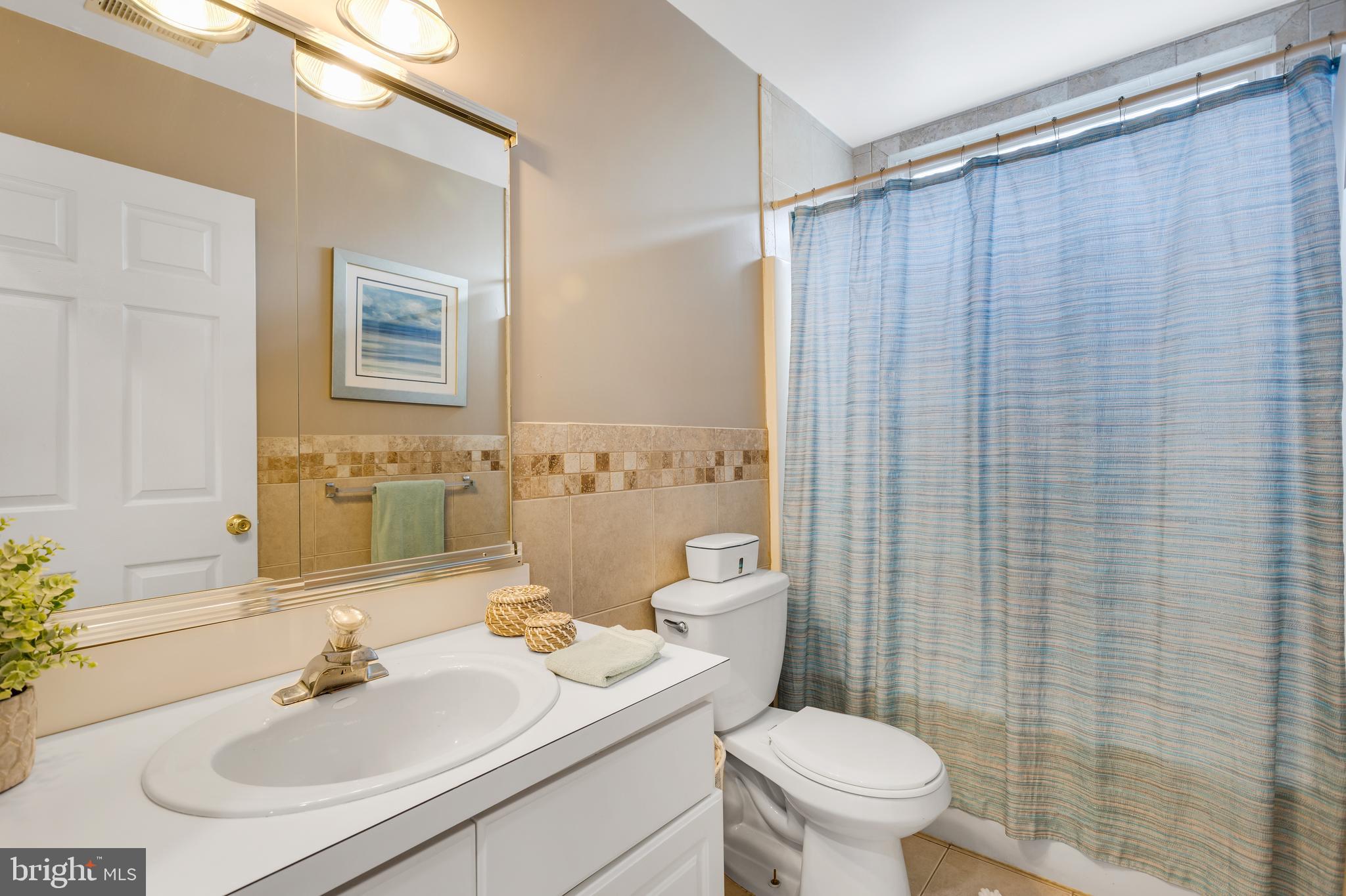135 Cornflower Road Trenton, NJ 08620 - Photo 27 of 31 a bathroom with a sink toilet and shower