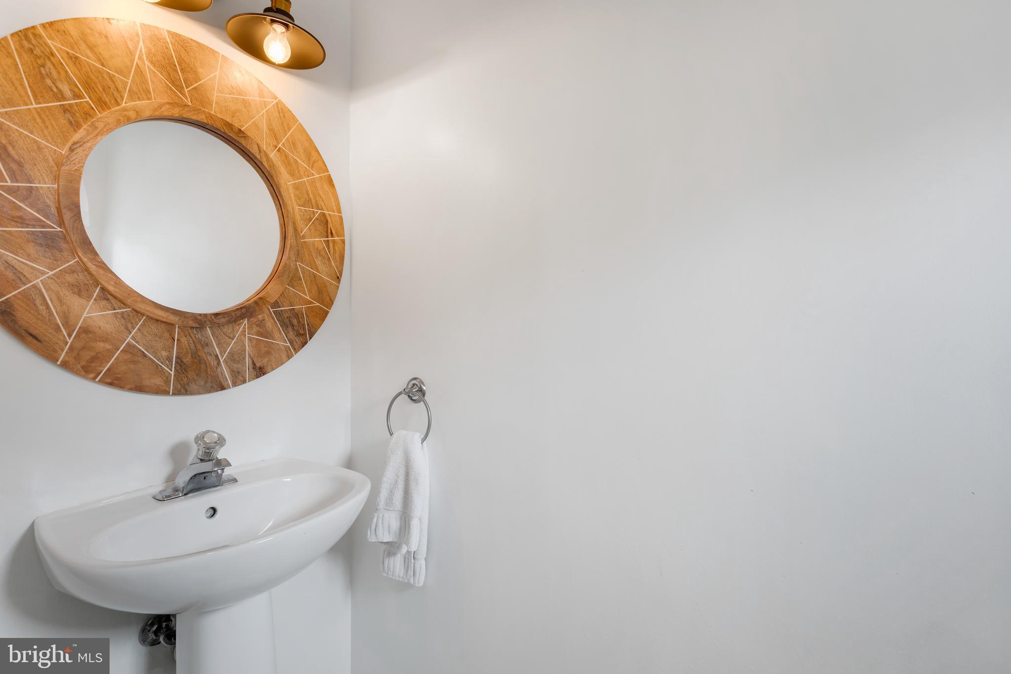 135 Cornflower Road Trenton, NJ 08620 - Photo 28 of 31 a bathroom with a sink and a mirror