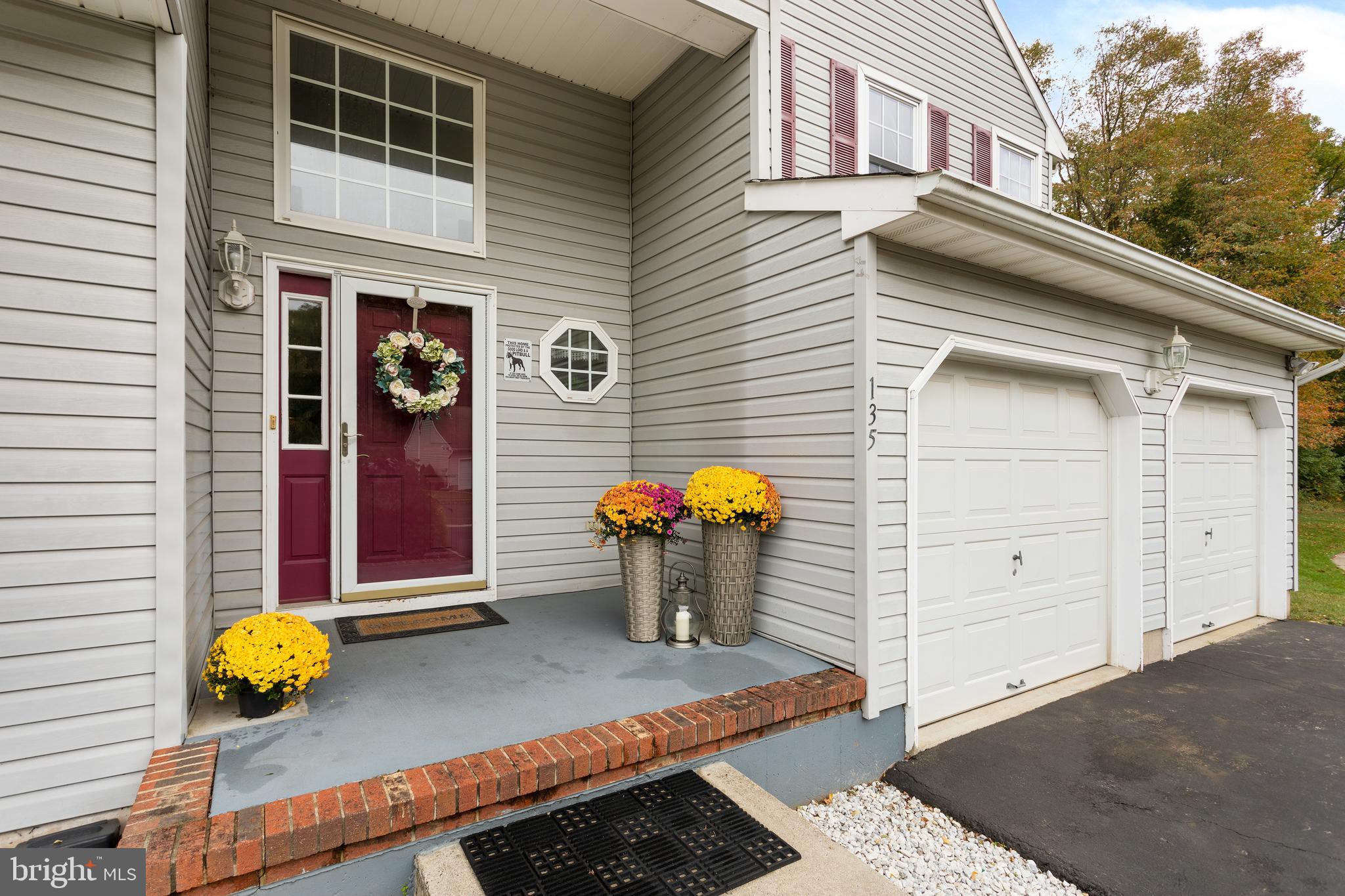 135 Cornflower Road Trenton, NJ 08620 - Photo 4 of 31 a view of the house and outdoor space