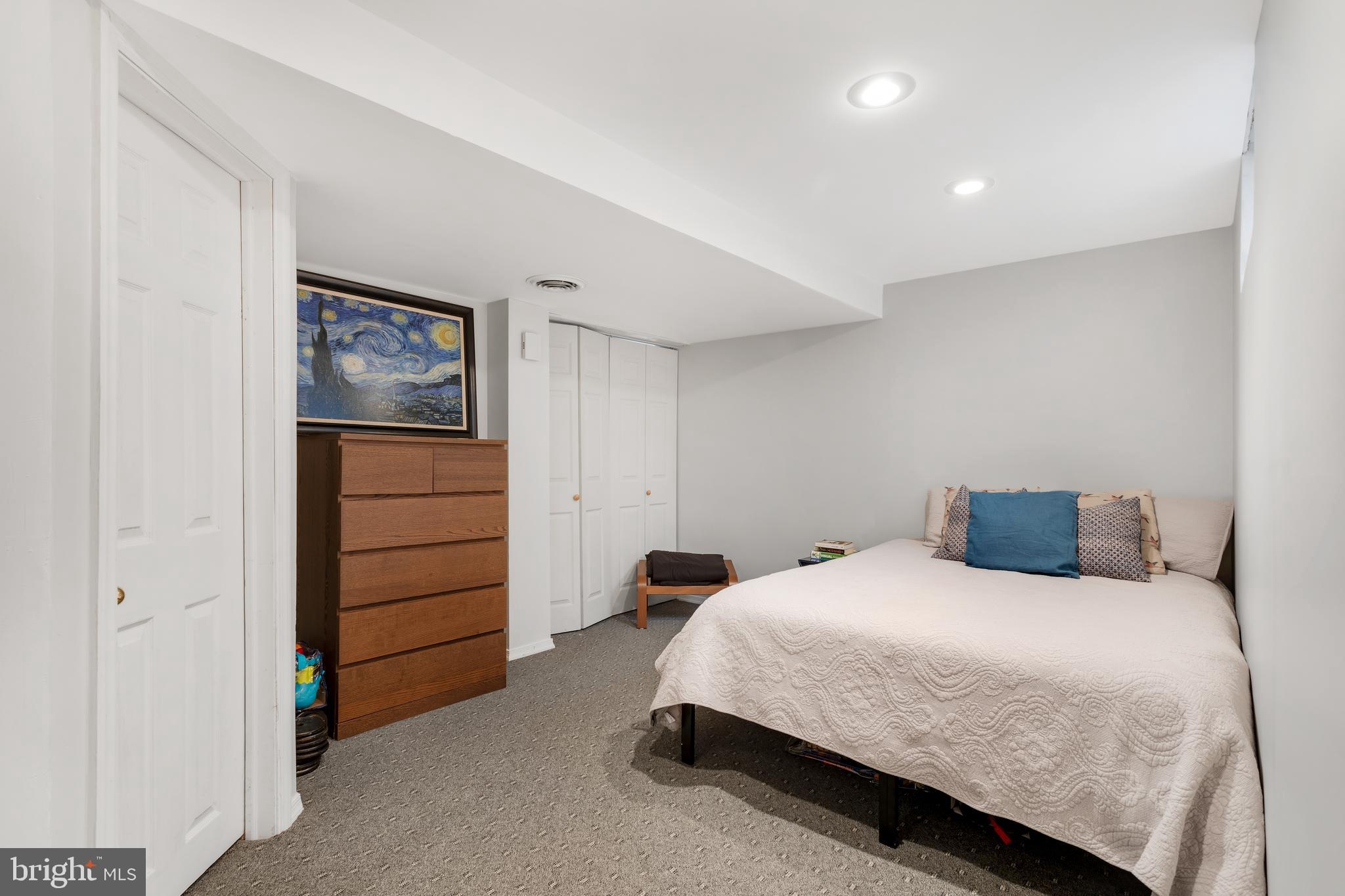 135 Cornflower Road Trenton, NJ 08620 - Photo 31 of 31 a bedroom with a bed and cabinet