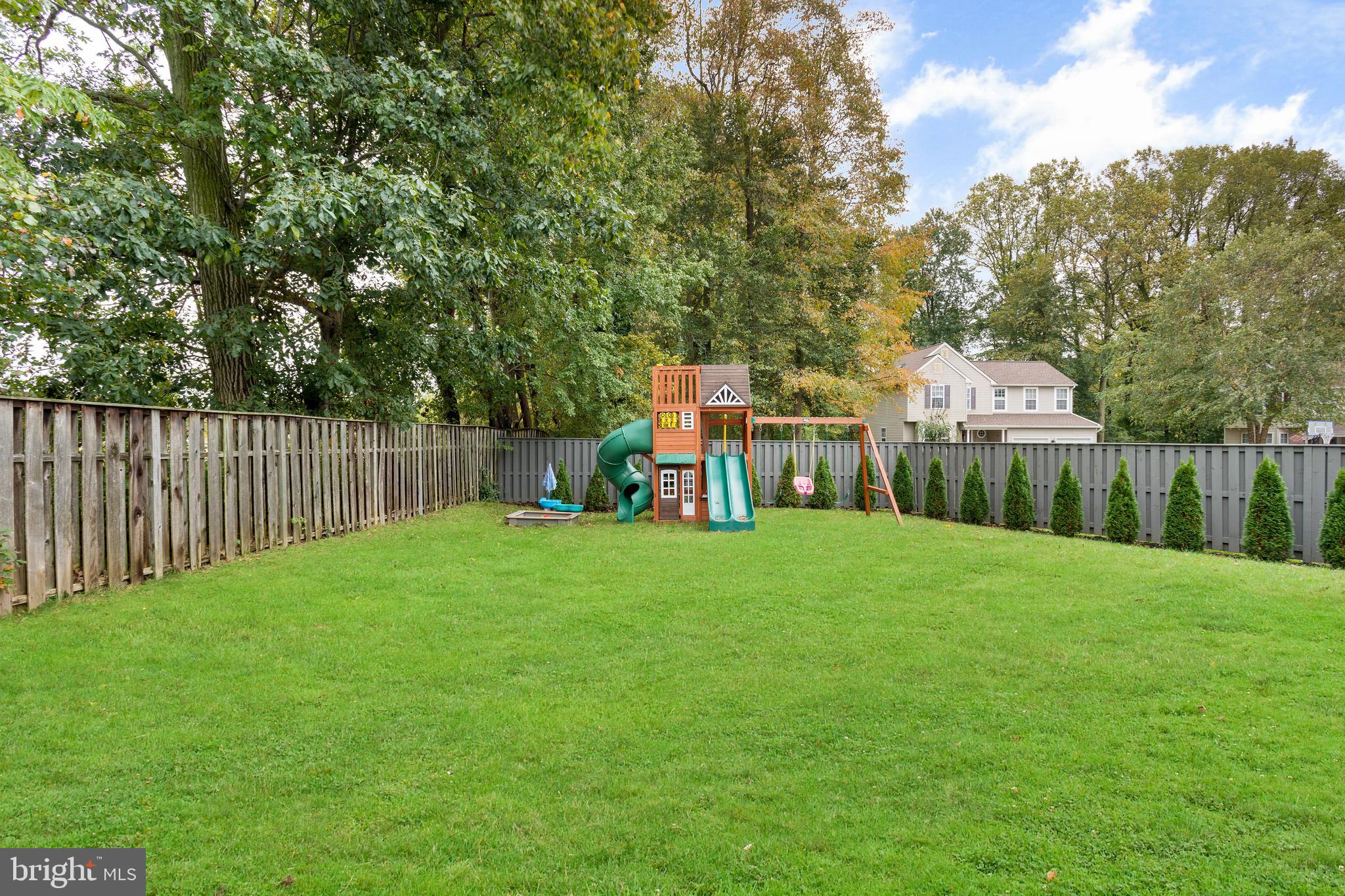 135 Cornflower Road Trenton, NJ 08620 - Photo 7 of 31 a house view with a garden space