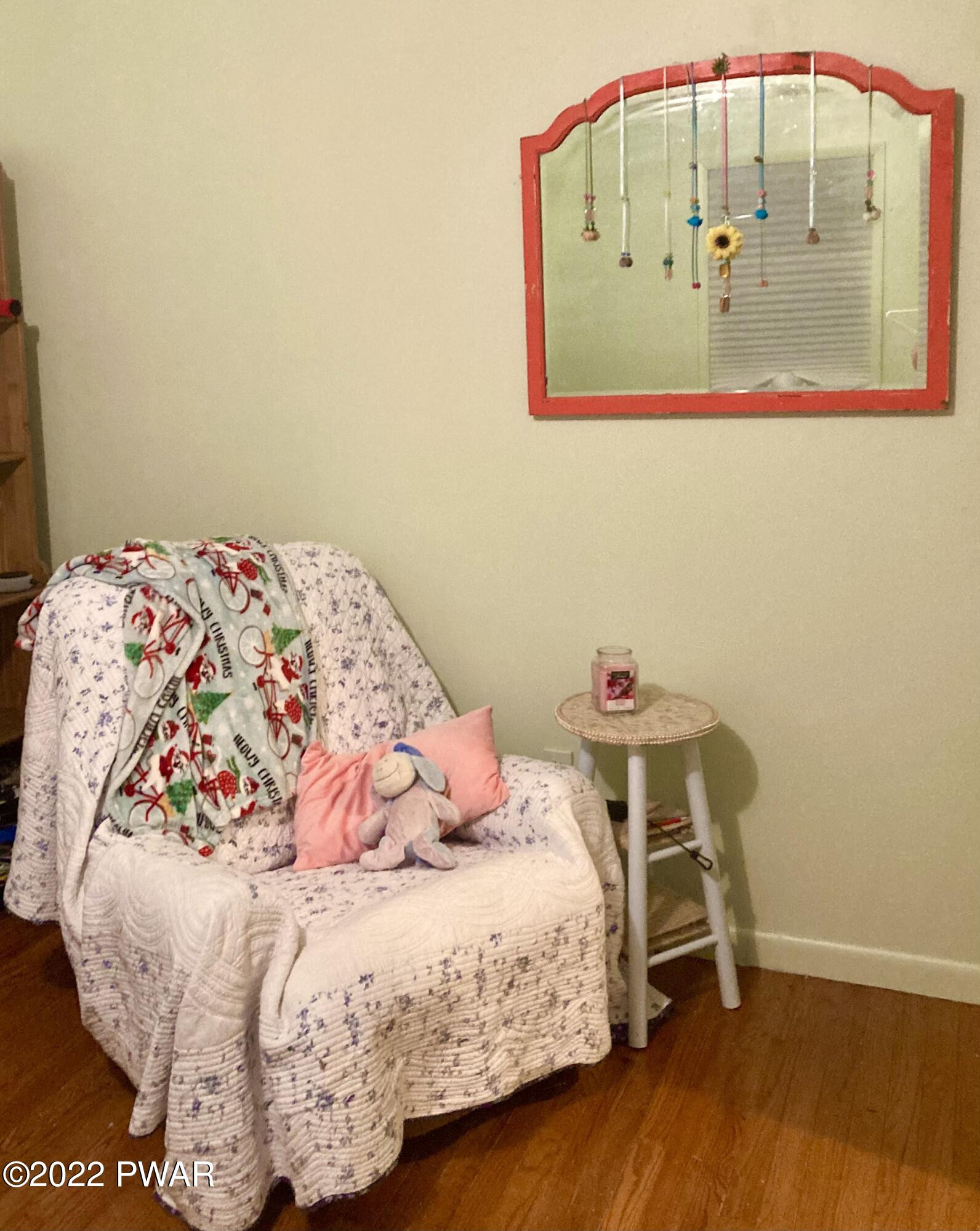 191 Fox Road Dingmans Ferry, PA 18328 - Photo 20 of 27 a bed sitting in a bedroom next to a window