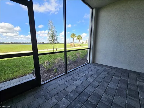 a view of a golf course with a lake