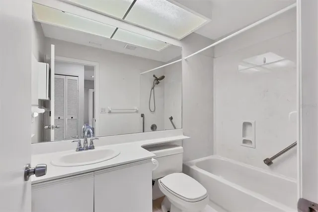 a front view of a house with a yard table and chairs