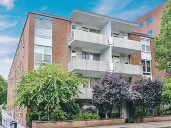 100 Marion Street, Unit 18 Brookline, MA 02446 - Photo 13 of 19 front view of a house with a street