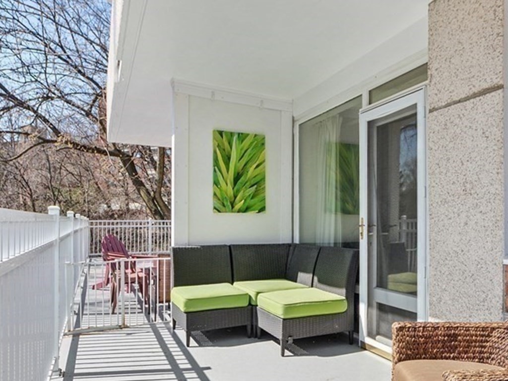 100 Marion Street, Unit 18 Brookline, MA 02446 - Photo 8 of 19 a outdoor space with a couch and a couch