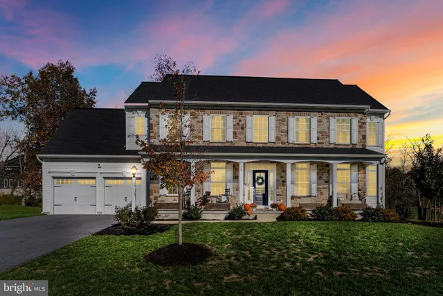 front view of house with a yard