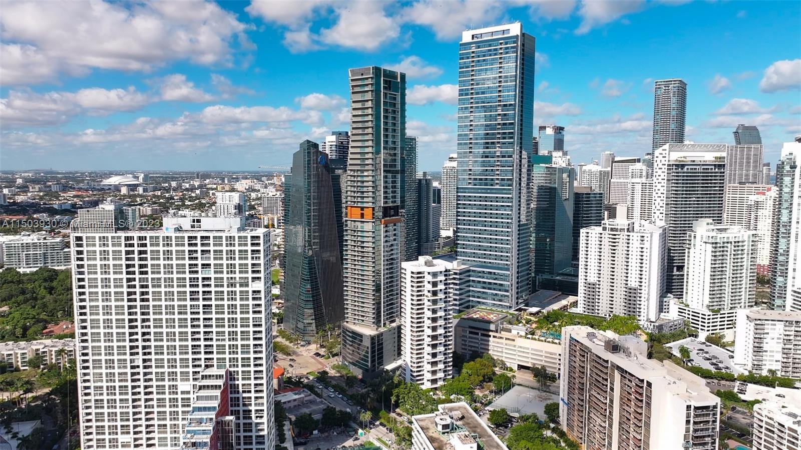 1451 Brickell Avenue, Unit 1803 Miami, FL 33131 - Photo 2 of 35 a city view with tall buildings