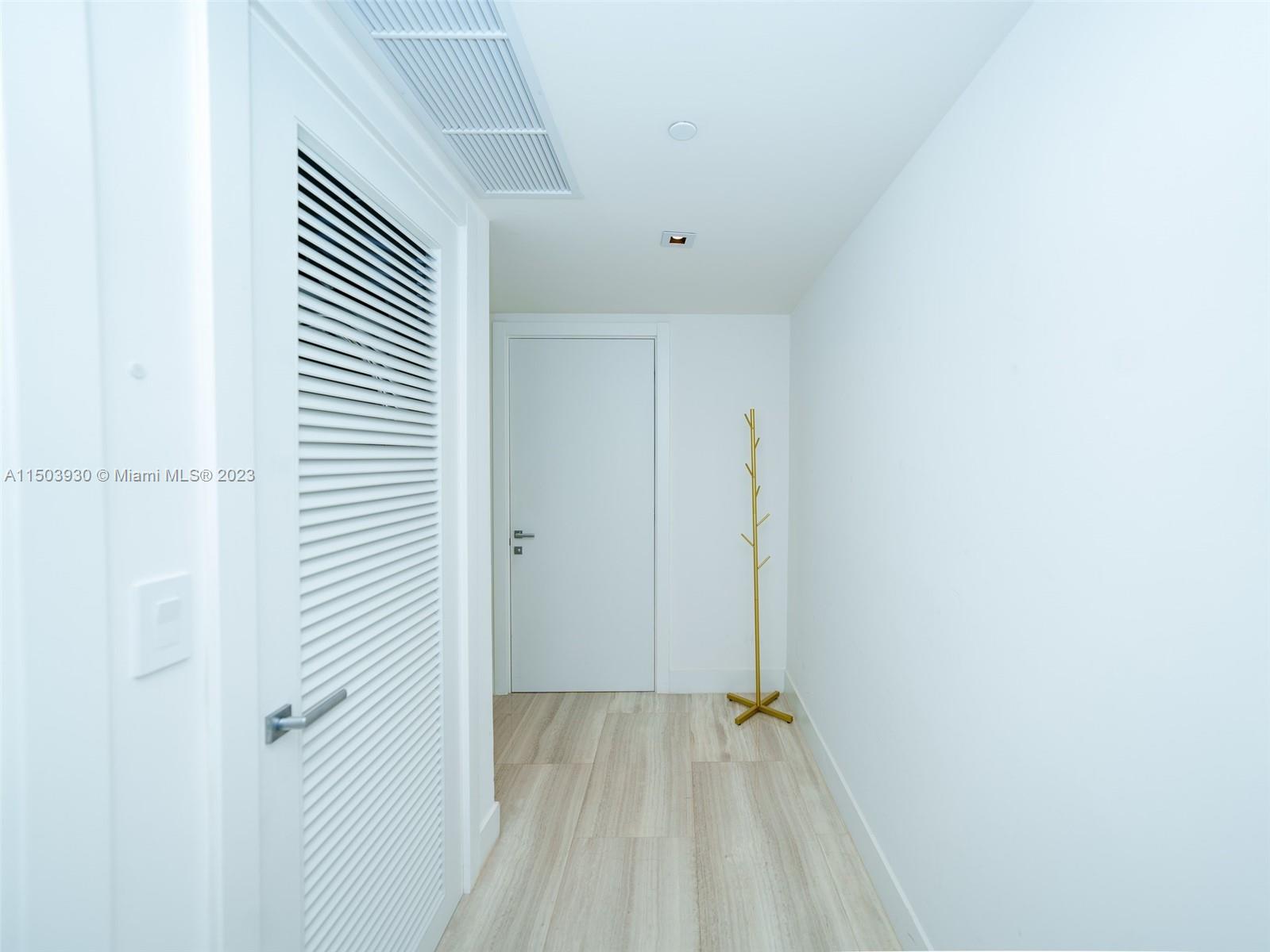 1451 Brickell Avenue, Unit 1803 Miami, FL 33131 - Photo 6 of 35 a view of an empty room