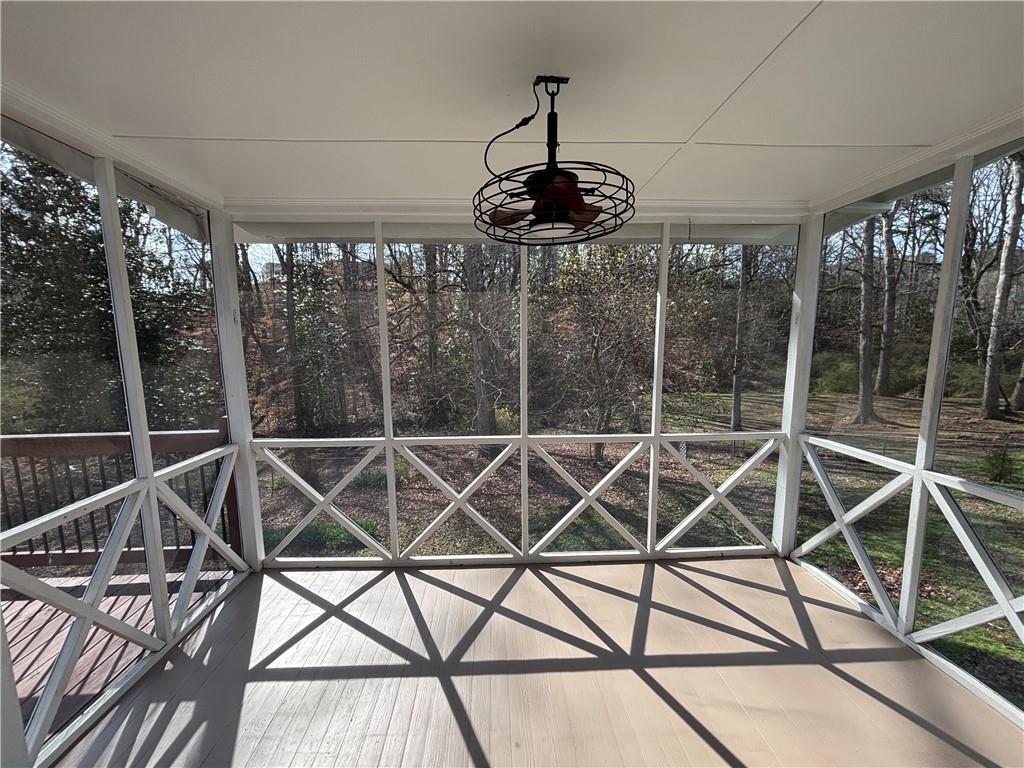 3854 Davis Street Suwanee, GA 30024 - Photo 20 of 24 a view of a room with furniture and chandelier