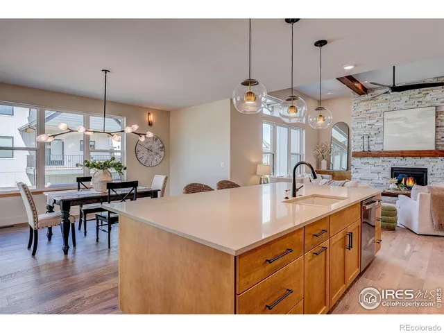 a kitchen with sink and cabinets
