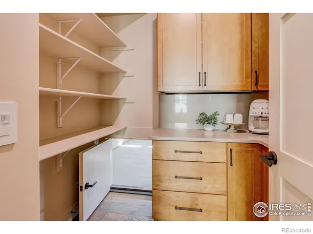 a kitchen with a cabinets and window