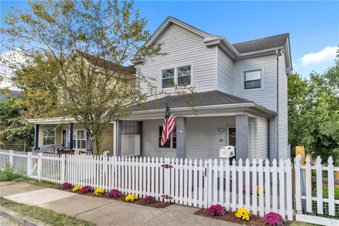 a front view of a house with a porch