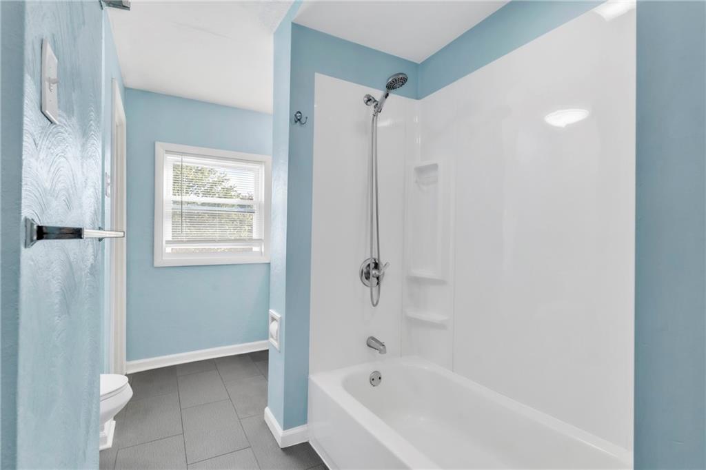 841 Railroad Street McKees Rocks, PA 15136 - Photo 23 of 44 a bathroom with a bathtub and shower