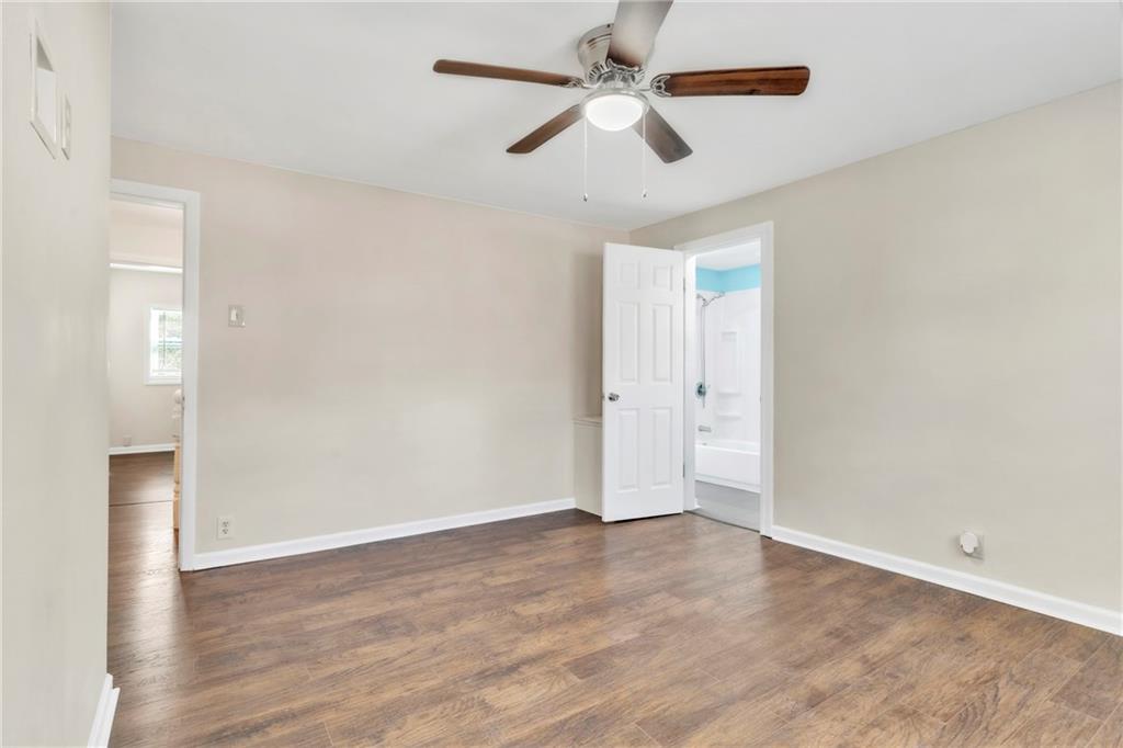 841 Railroad Street McKees Rocks, PA 15136 - Photo 26 of 44 wooden floor in an empty room with a window