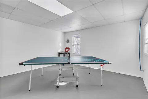 a room with table and chairs