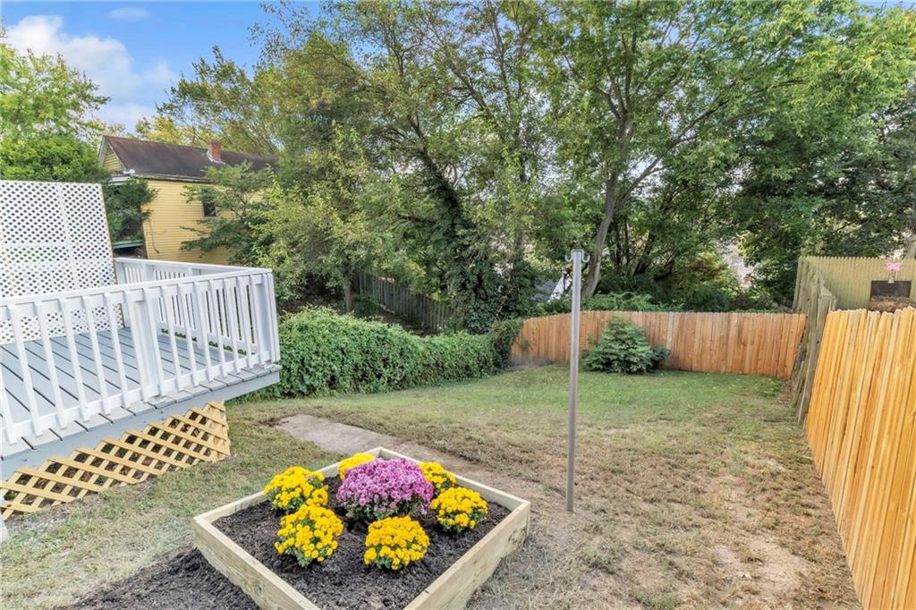 841 Railroad Street McKees Rocks, PA 15136 - Photo 38 of 44 a view of a backyard with wooden fence