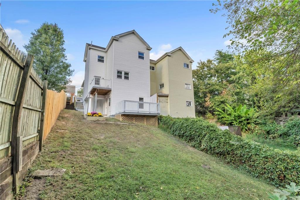 841 Railroad Street McKees Rocks, PA 15136 - Photo 40 of 44 a view of a house with backyard and a tree