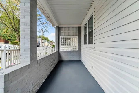 a view of an empty room and window