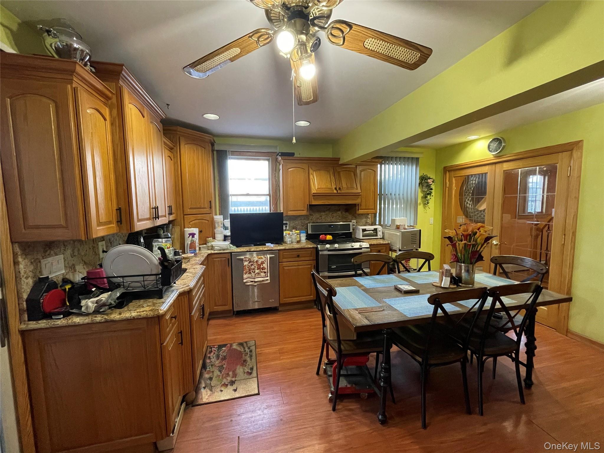 104 Ostend Road Island Park, NY 11558 - Photo 20 of 42 a view of a dining room with furniture