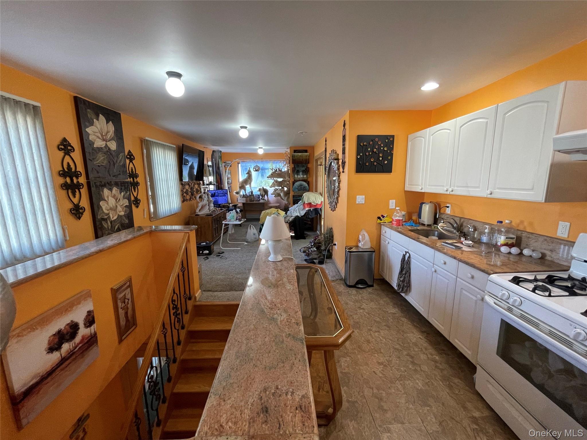 104 Ostend Road Island Park, NY 11558 - Photo 42 of 42 a very nice looking room with a large window