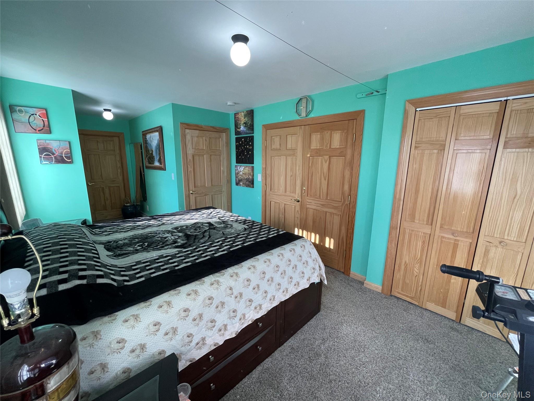 104 Ostend Road Island Park, NY 11558 - Photo 34 of 42 a bedroom with a bed and a window