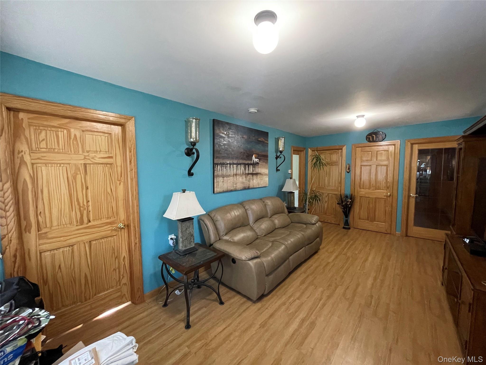 104 Ostend Road Island Park, NY 11558 - Photo 5 of 42 a living room with furniture and a window