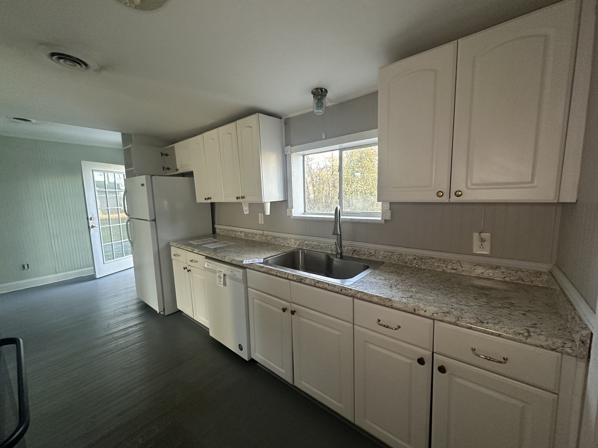 110 Main Street White Bluff, TN 37187 - Photo 4 of 9 a kitchen with sink cabinets and window