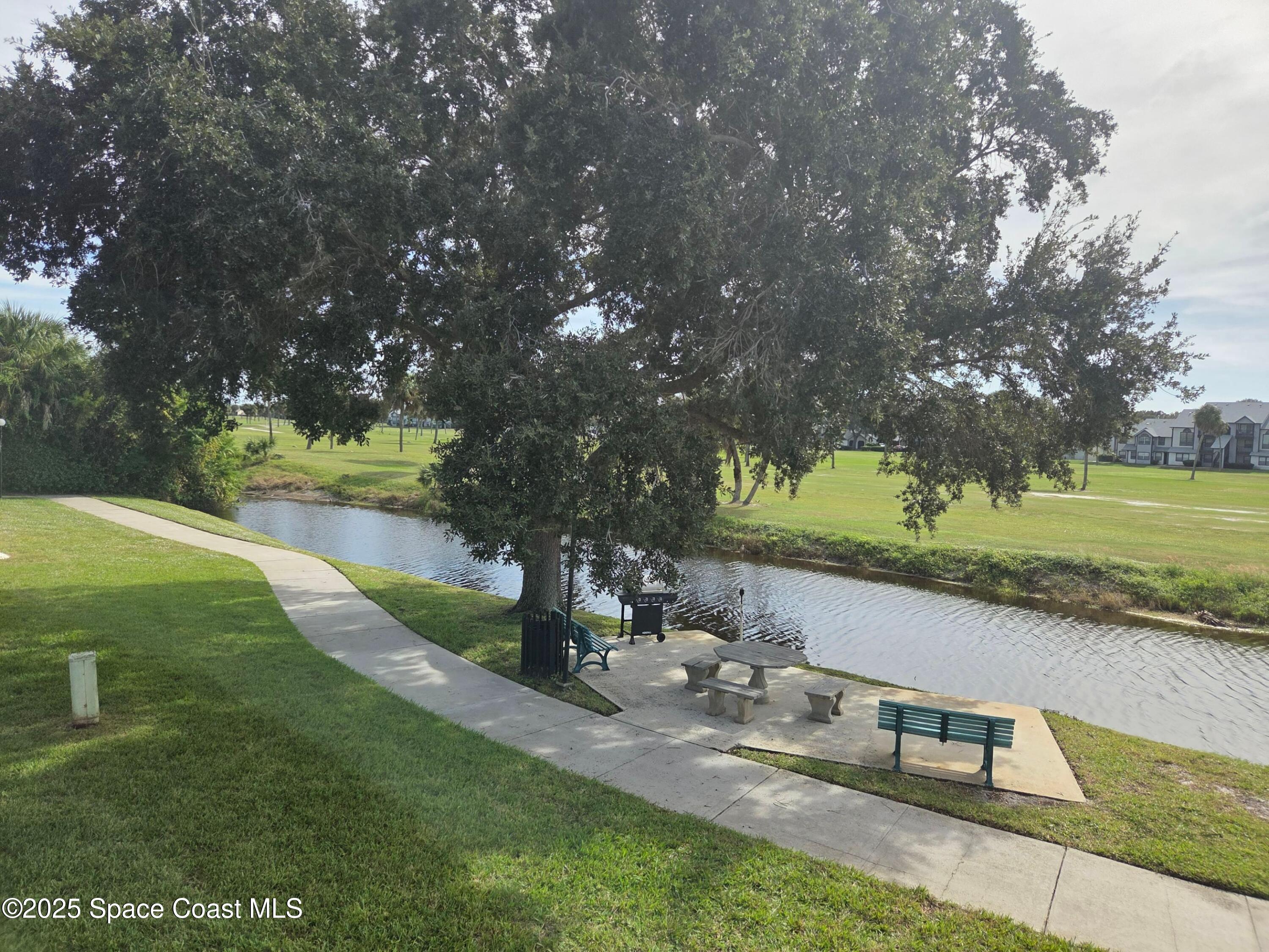 2727 North Wickham Road, Unit 20611 Melbourne, FL 32935 - Photo 10 of 10 a view of a lake view
