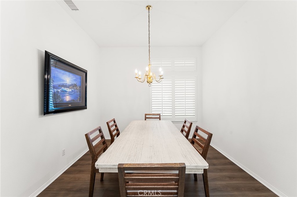 2061 Pecan Tree Street Hemet, CA 92545 - Photo 12 of 23 a view of a dining room with furniture