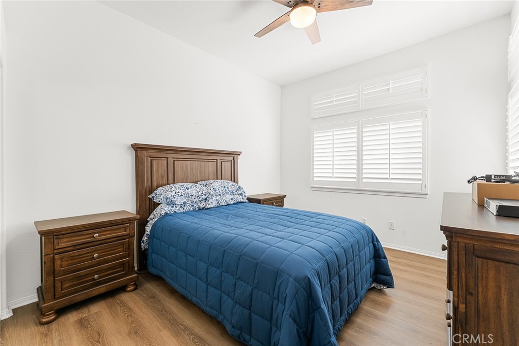 2061 Pecan Tree Street Hemet, CA 92545 - Photo 15 of 23 a bedroom with a bed and a window