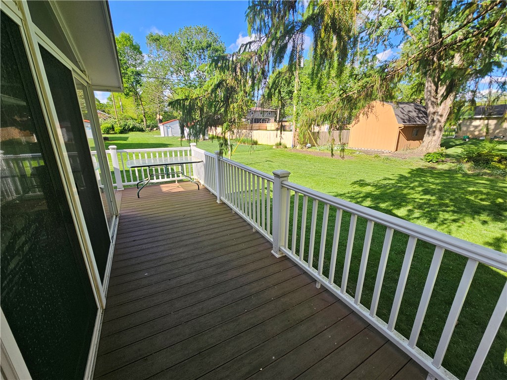 3998 Willowcrest Road Beavercreek, OH 45430 - Photo 21 of 41 This spacious deck overlooks a verdant yard, offering a tranquil outdoor retreat.