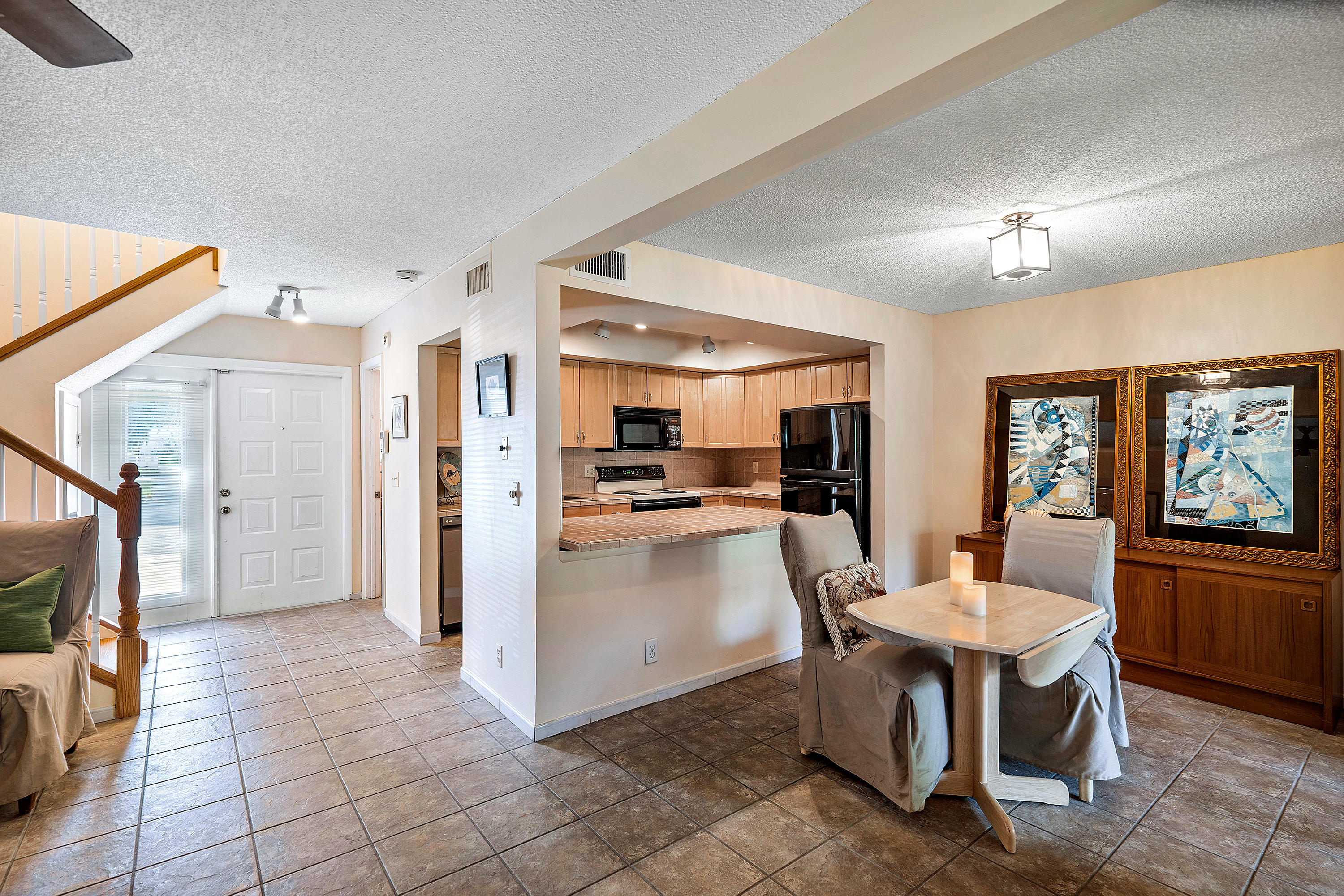 7200 Northwest 2nd Avenue, Unit 89 Boca Raton, FL 33487 - Photo 8 of 22 dining-kitchen-foyer