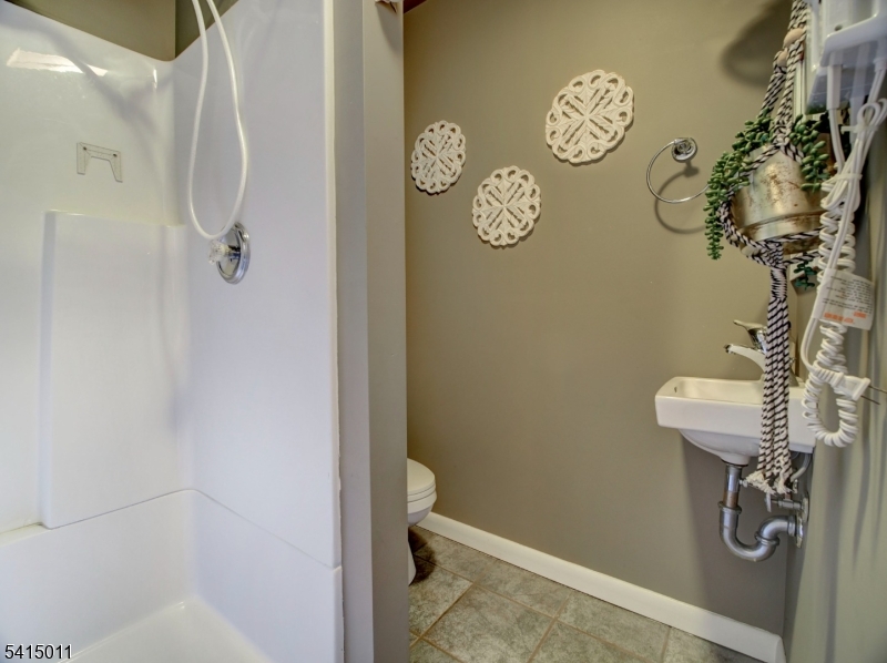 23 Ryerson Road Flemington, NJ 08822 - Photo 42 of 44 a bathroom with a shower and a toilet