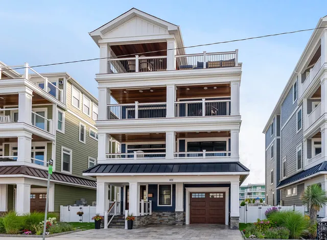 a front view of a building with lot of windows
