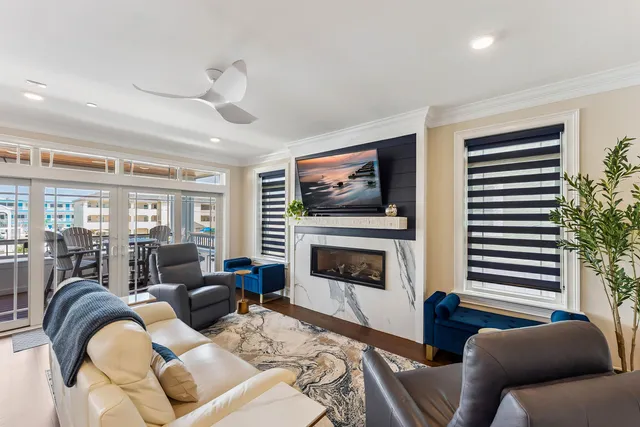 a living room with furniture or couch and a fireplace